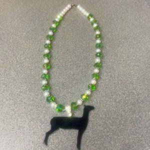 Green and white beaded necklace with Lamb pendant